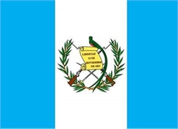 [ai] The flag of Guatemala featuring three vertical stripes: blue on the outer sides and white in the center. A coat of arms is positioned in the white stripe, with a scroll reading 'Libertad 15 de Septiembre de 1821' surrounded by two crossed rifles and two laurel branches.